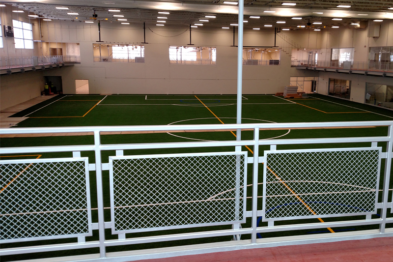 Direct Metals Woven Wire Mesh On Handrail Panel Inserts at an Indoor Soccer Facility