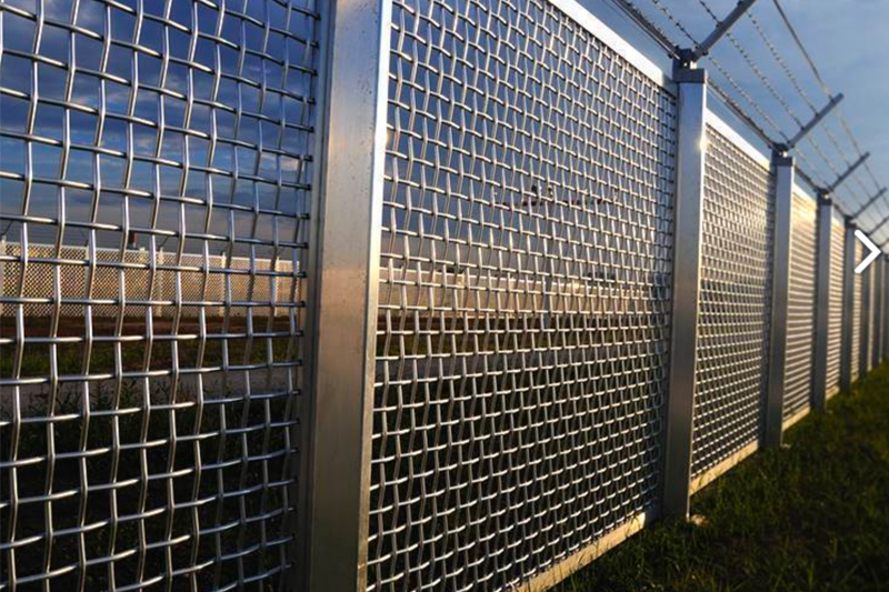 Direct Metals Woven Wire Mesh Panel Inserts For Fence At A Security Facility