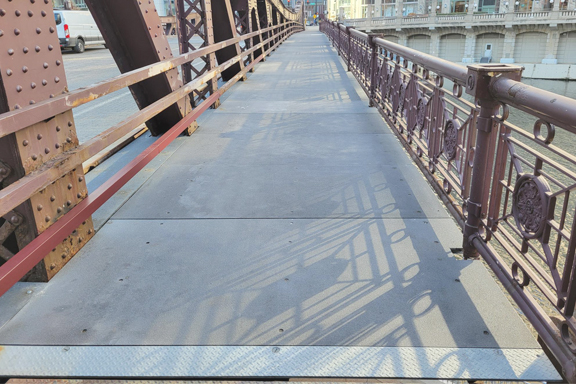 Fiberglass floor plates on the Franklin Street Bridge provided by Direct Metals®, the best place to buy fiberglass grating.